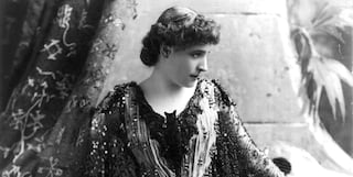a vintage photograph of lillie langtry wearing a beaded gown