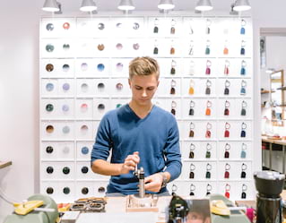 artisan making sunglasses in florence workshop
